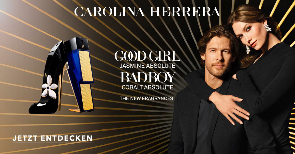 Werbeanzeige von Carolina Herrera für „Good Girl Jasmine Absolute“ und „Bad Boy Cobalt Absolute“: Parfümflakons vor gold-schwarzem Strahlenhintergrund, daneben zwei Personen in schwarzer Kleidung. Text: „Jetzt entdecken“.