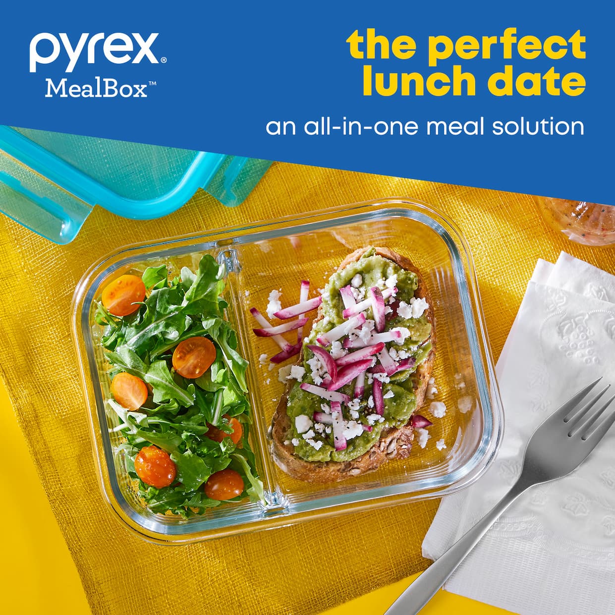 Mealbox container with food in two compartments in a kitchen scene with no lid