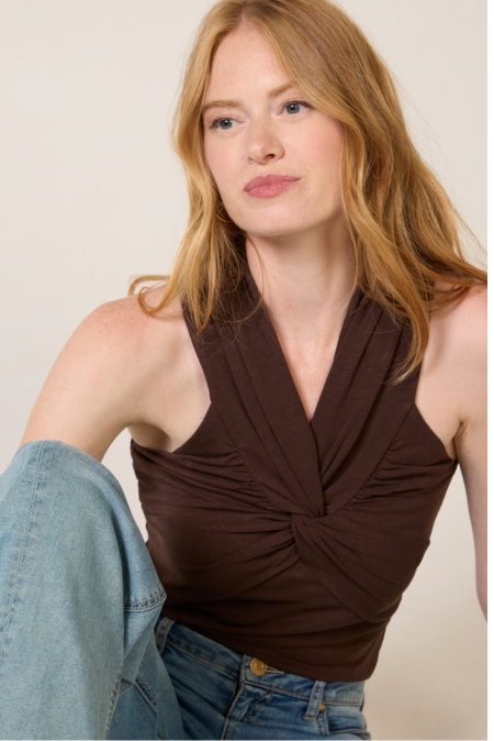 Image of model pairing brown halter tank with ruching with denim jeans from EVEREVE