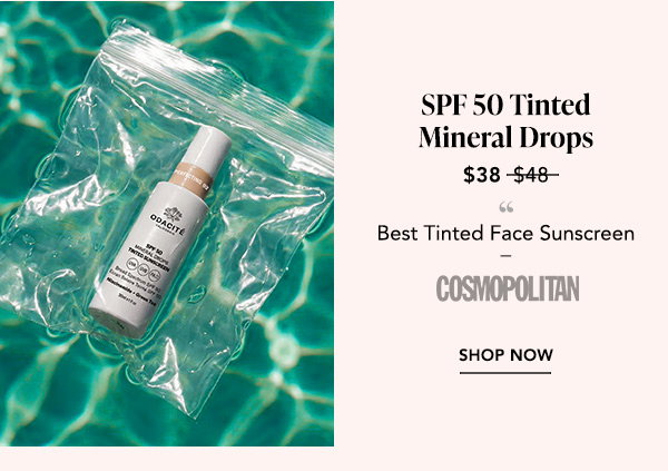 SPF 50 Tinted Mineral Drops: Bottle of SPF 50 Tinted Mineral Drops floating in pool water; named Best Tinted Face Sunscreen by Cosmopolitan, now $38.