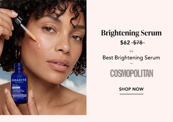 Woman applying Brightening Serum beside the blue bottle; named Best Brightening Serum by Cosmopolitan, now $62.