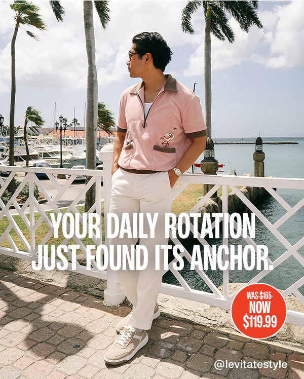 Model standing by the marina wearing the Dawson Moc Toe sneaker with casual summer styling. Text reads: 