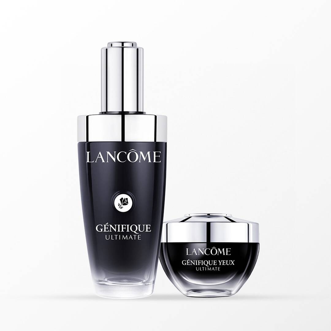 Vasetto Lancôme Absolue posizionato al centro di una confezione pop-up rosa aperta a forma di fiore