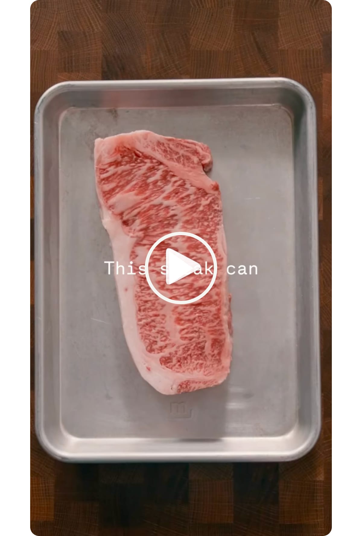 Image of a raw steak on a sheet pan