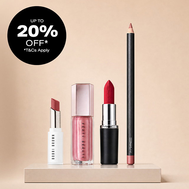 Lip and nail products from Bobbi Brown, Fenty Beauty, and MAC are arranged on a shelf. A circular label states 'Up to 20% off* *T&Cs Apply.'The background is a soft beige. 