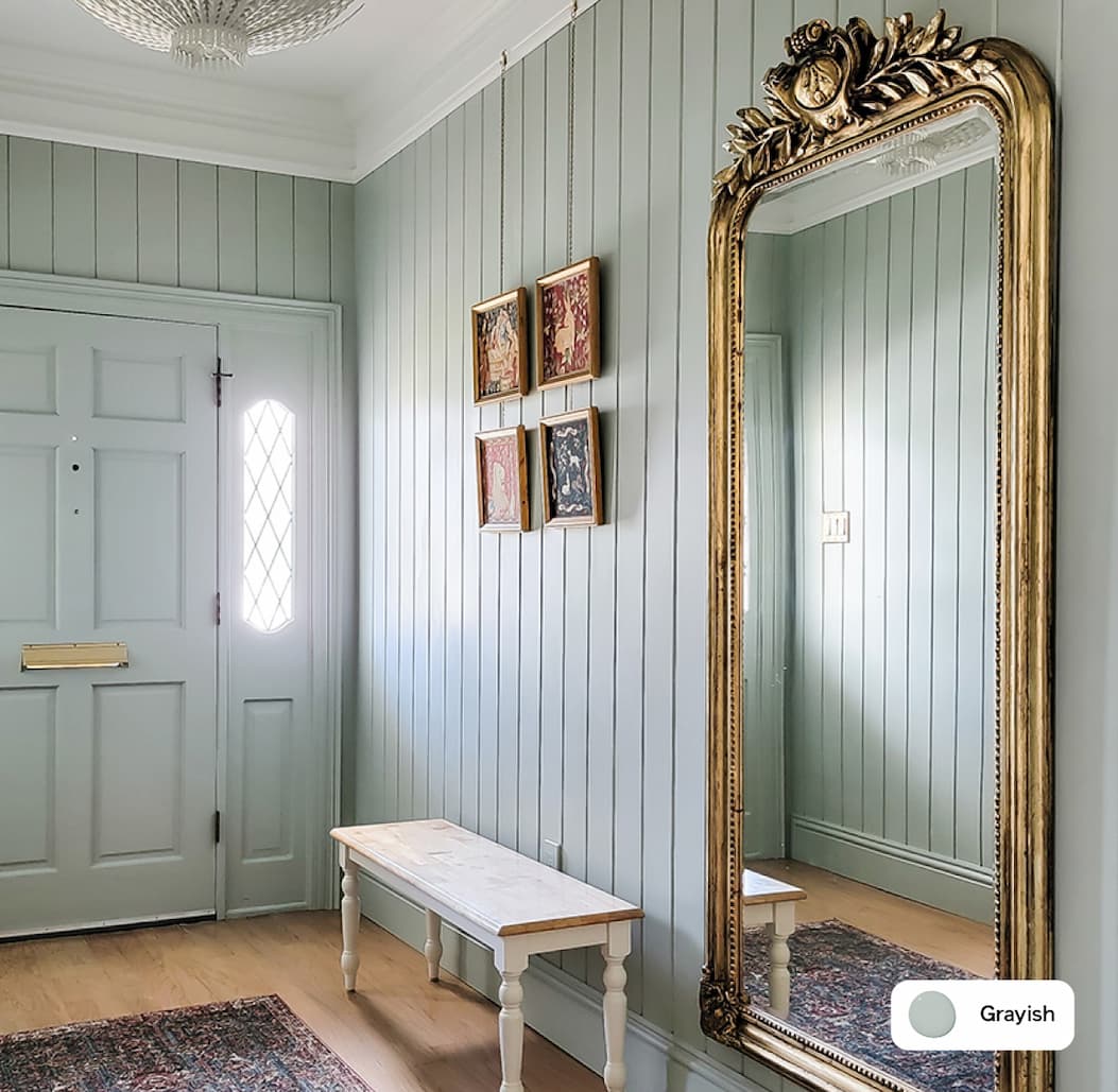 Entryway featuring gray paint color Grayish
