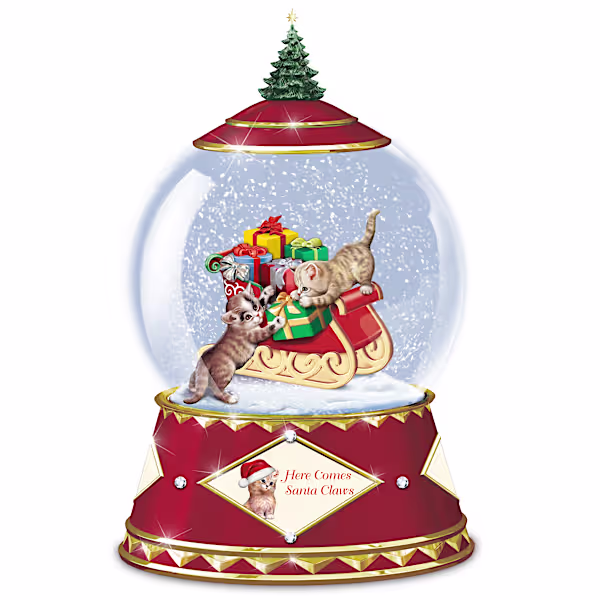 Handcrafted holiday snowglobe features Jürgen Scholz's beloved kitten art in 2 and 3 dimensions