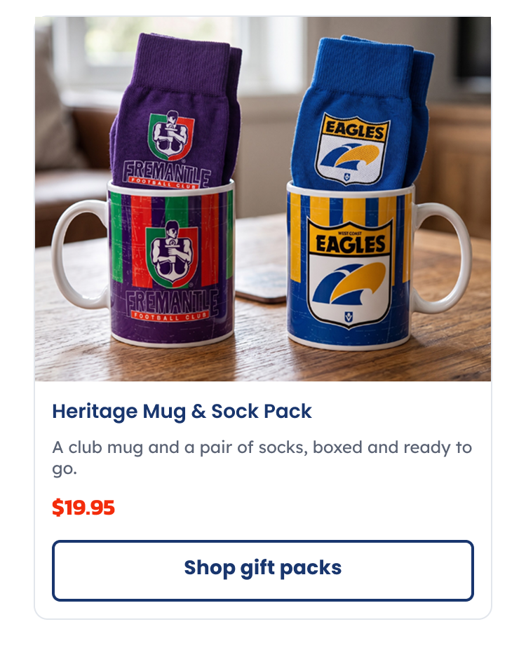 A pair of heritage mug and sock packs sitting on a table