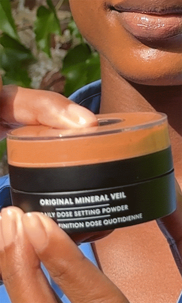 Model applying Original Loose and Daily Dose Foundation Duo