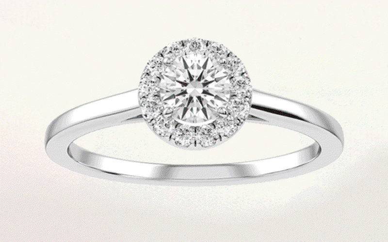 Rotating imagery of different metal & diamond detailed bands with various shaped diamond stones.