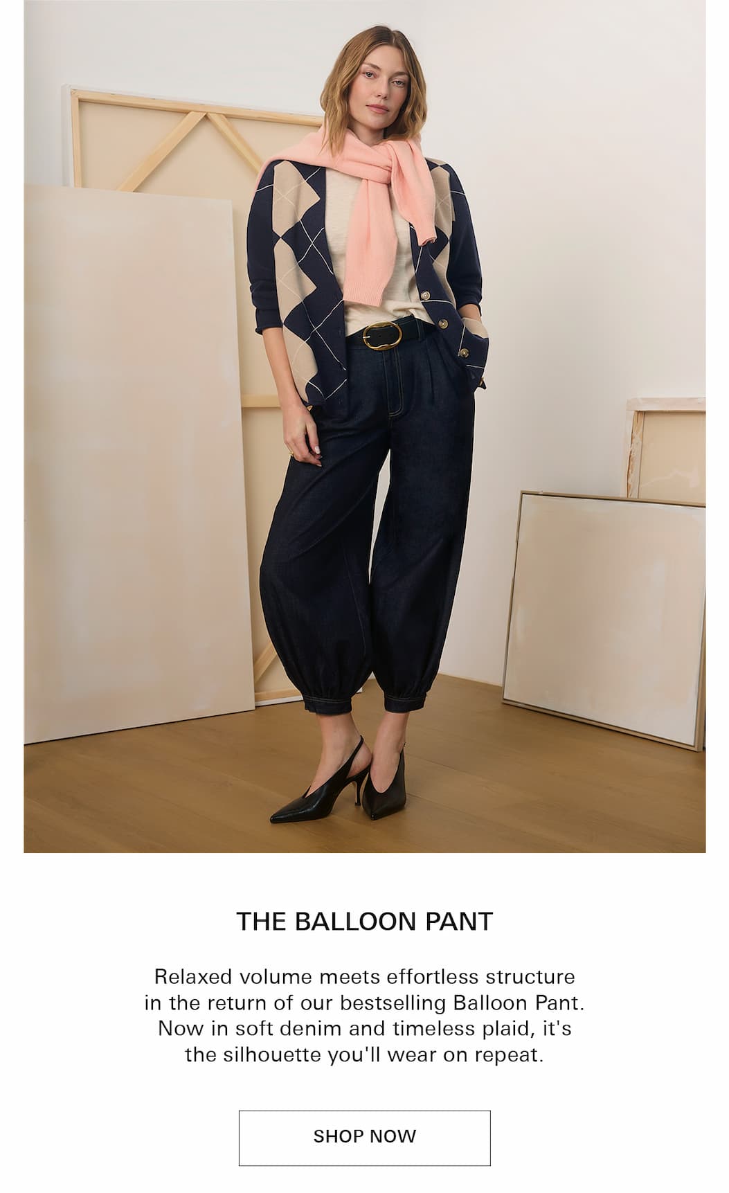 NEW IN BALLOON PANT in denim wearing argyle sweater