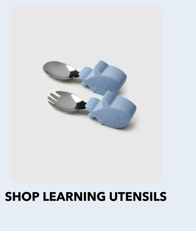 baby spoon and fork with blue shark shaped handles