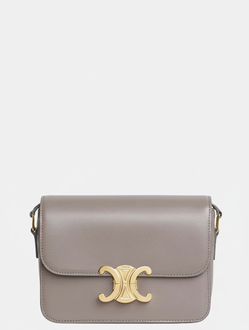 A taupe leather Celine Triomphe bag with gold hardware.