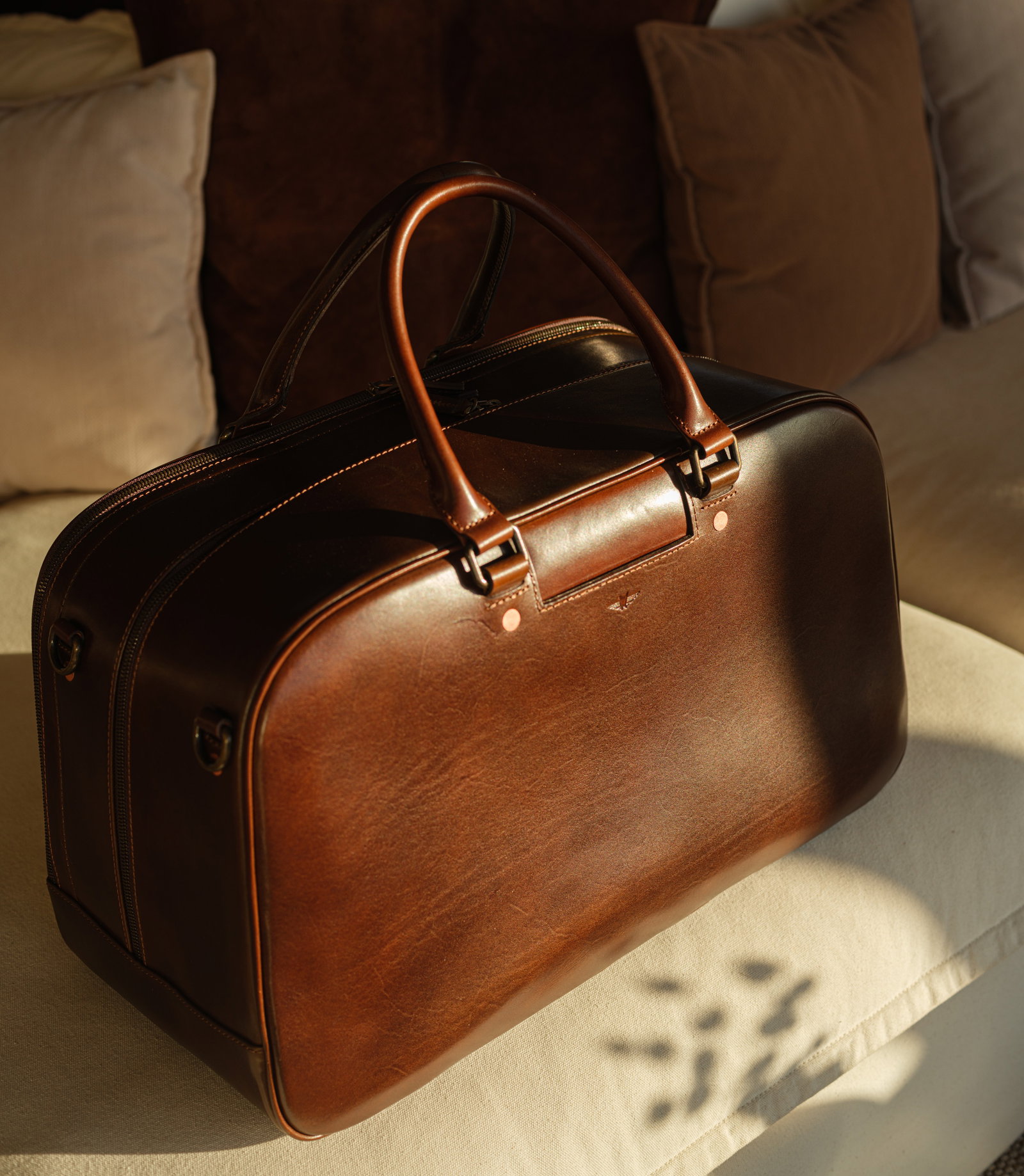 Close-up shot of the Weekender bag - bag on couch in direct sunlight