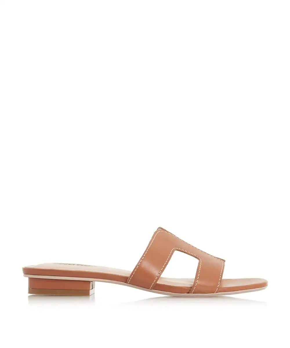 Stay smart and stylish this summer with Dune London's Loupe slider sandal. Featuring a cut out design with contrast stitching and a low block heel. An...