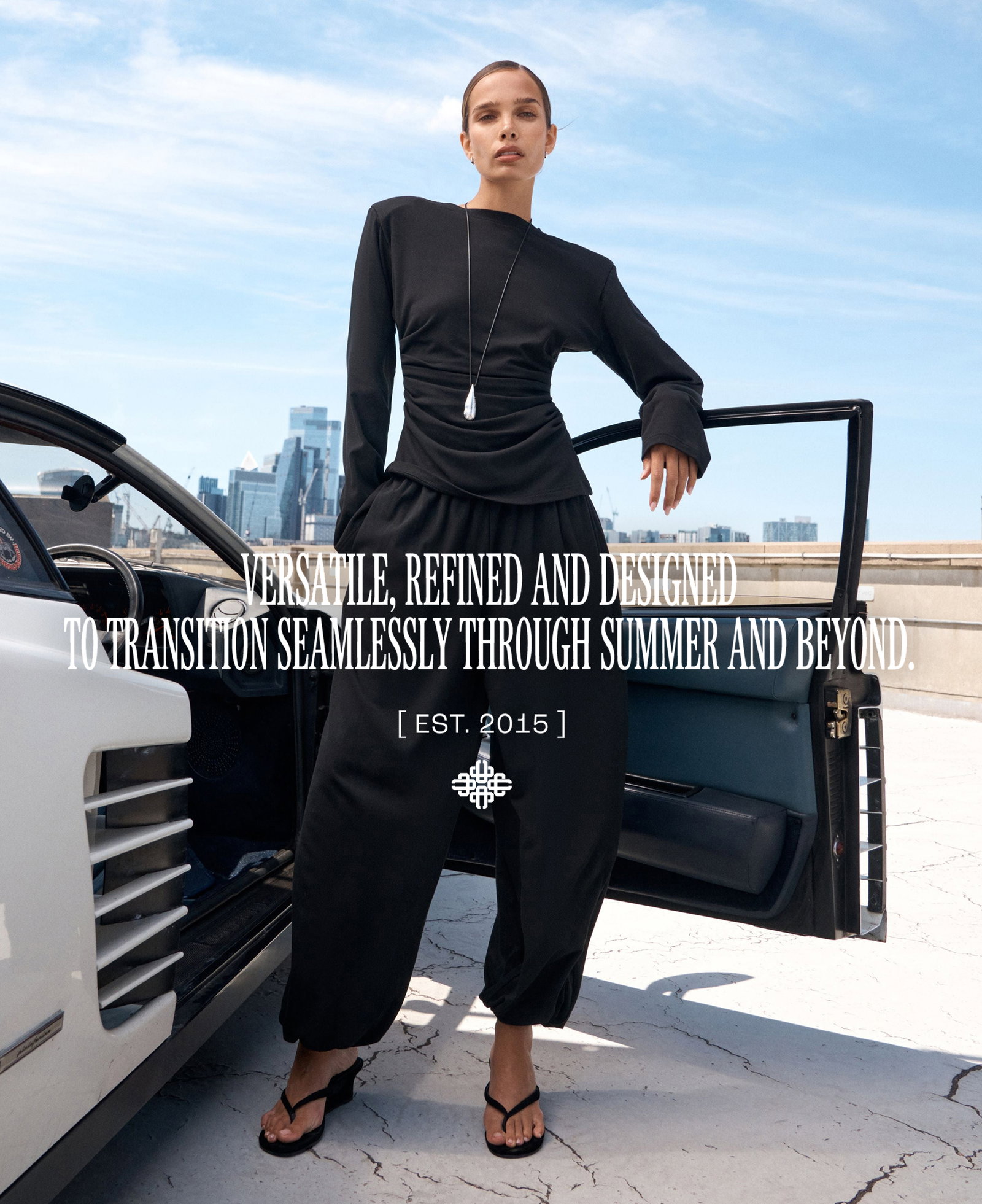 LONG SLEEVE SHOULDER PAD RUCHED TEE