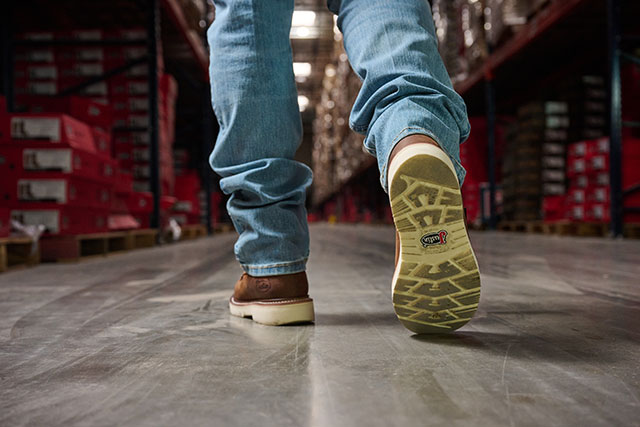 A man wearing the Bristol 6" Waterproof Steel Toe work boot in Hazel (Brown).