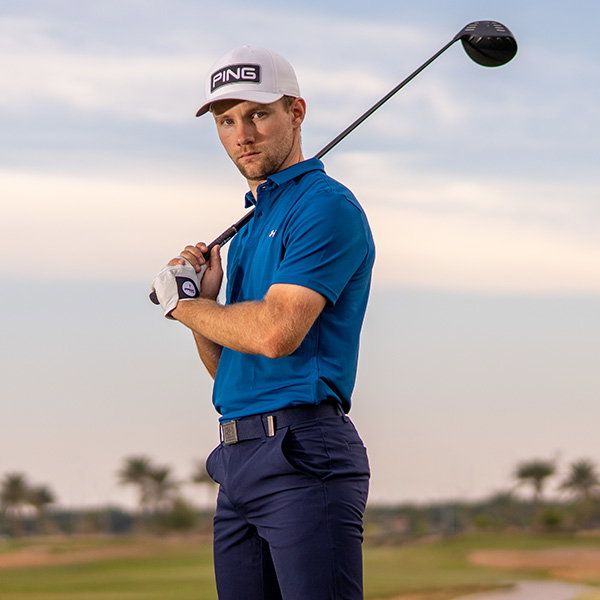 Golfer with driver over his shoulder