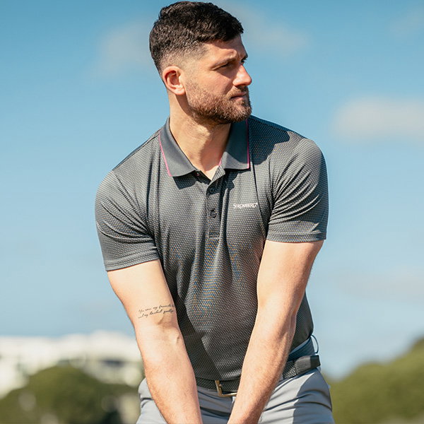 Golfer preparing to tee off