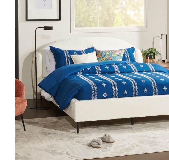 Luna Upholstered Wingback Bed.
