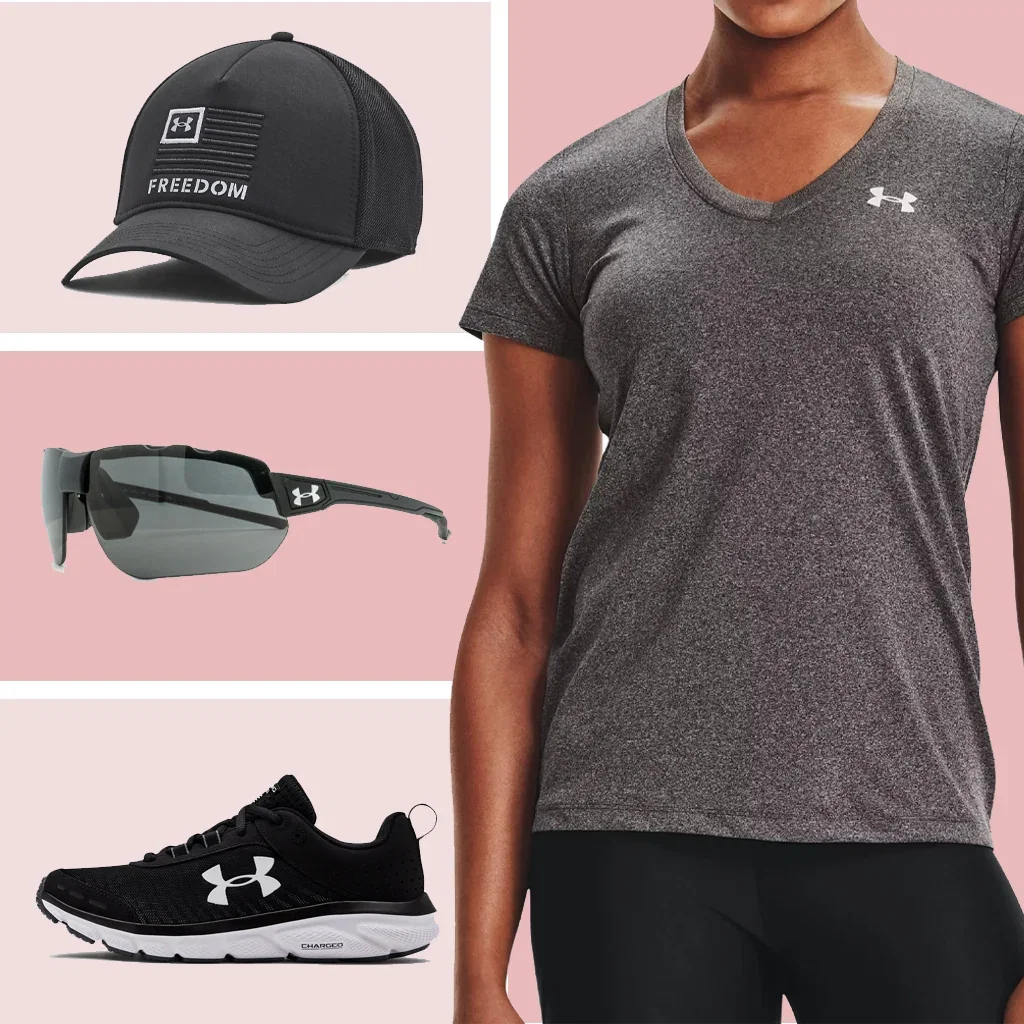 Under Armour activewear collection featuring a black Freedom cap, gray V-neck t-shirt, black sunglasses, and black running shoes.