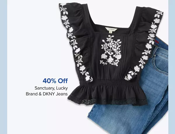 40% off Sanctuary, Lucky Brand and DKNY Jeans. A black womens top with a pair of denim jeans.