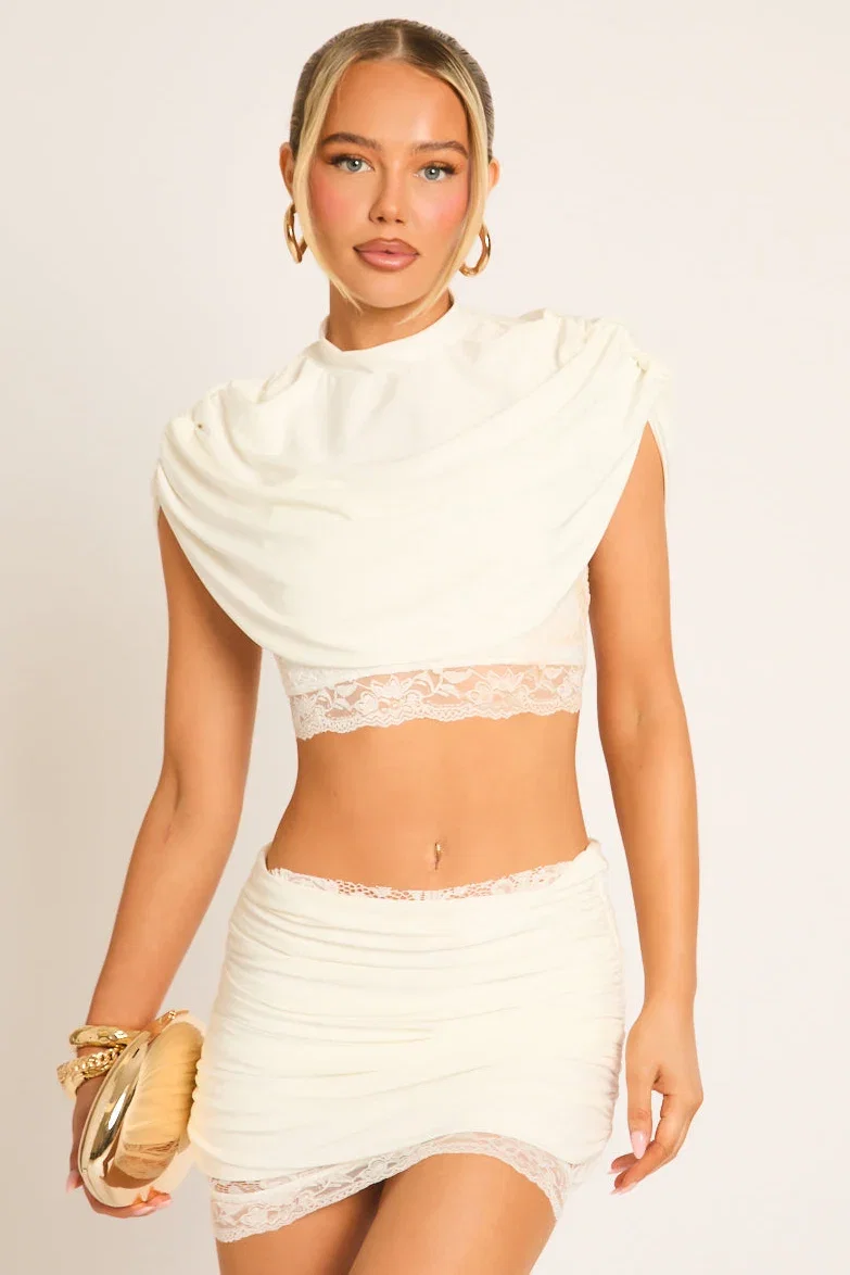 Image of White Lace Trim Cape Top and Mini Skirt Co-ord Set - Nadia