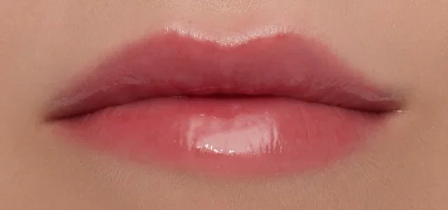 Close-up of lips wearing Extra Plump Lip Serum.