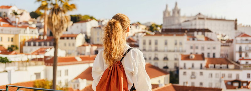 Woman overlooking city