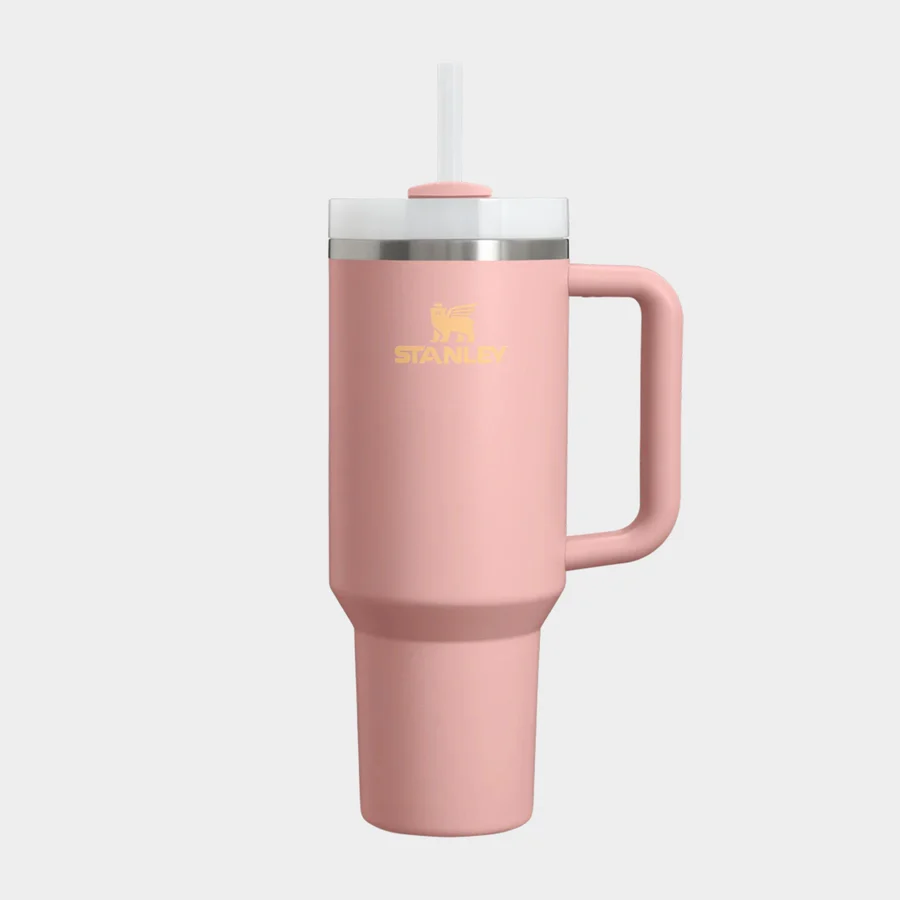 Pink Stanley flask with yellow Stanley logo.