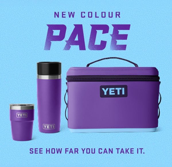 Purple YETI cooler, bottle and tumbler in the new Pace colour against a blue background.