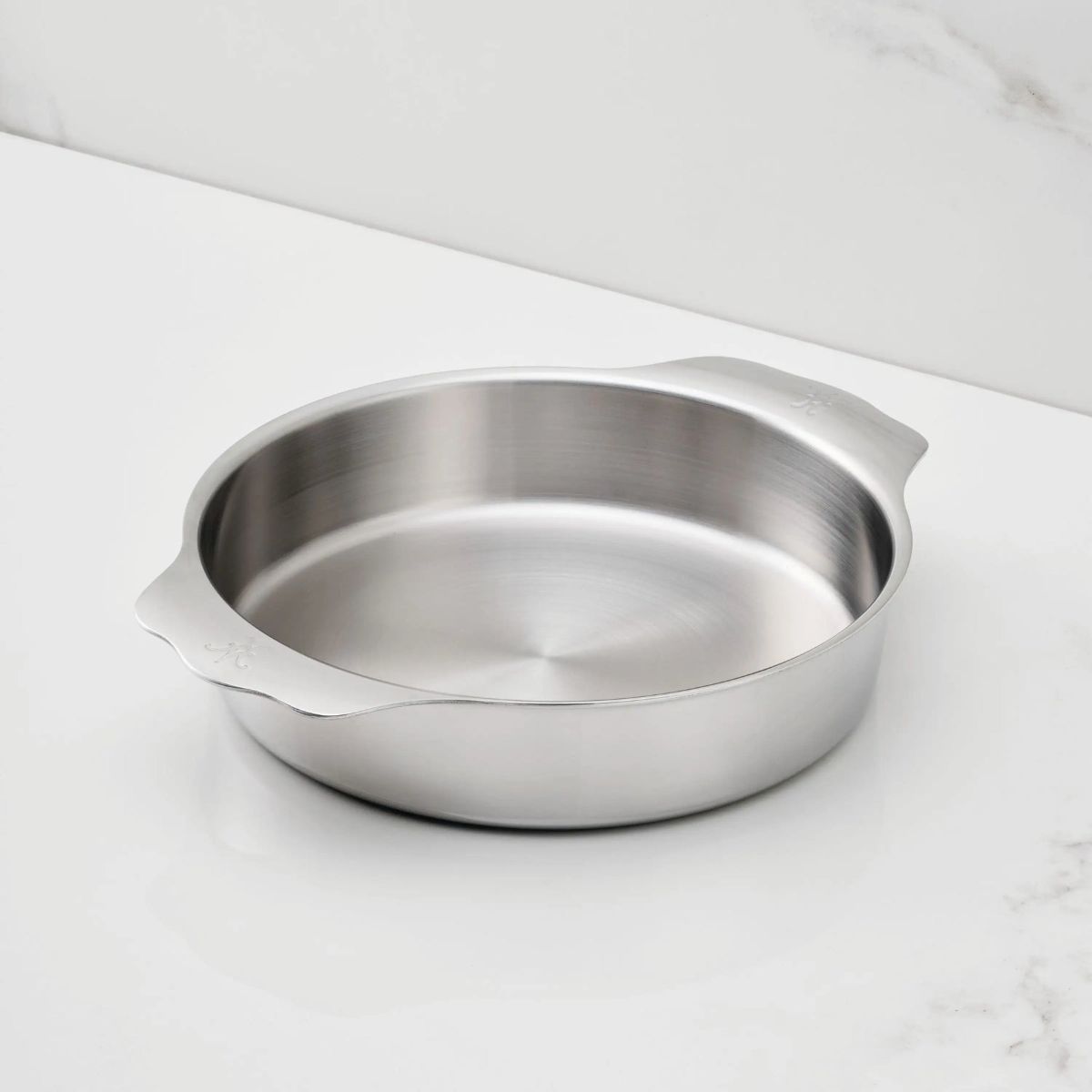 IMG: OvenBond Round Baker, 9-inch on marble countertop