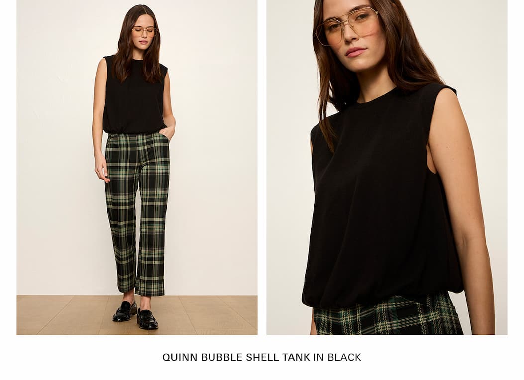 model wears black bubble top and plaid pants