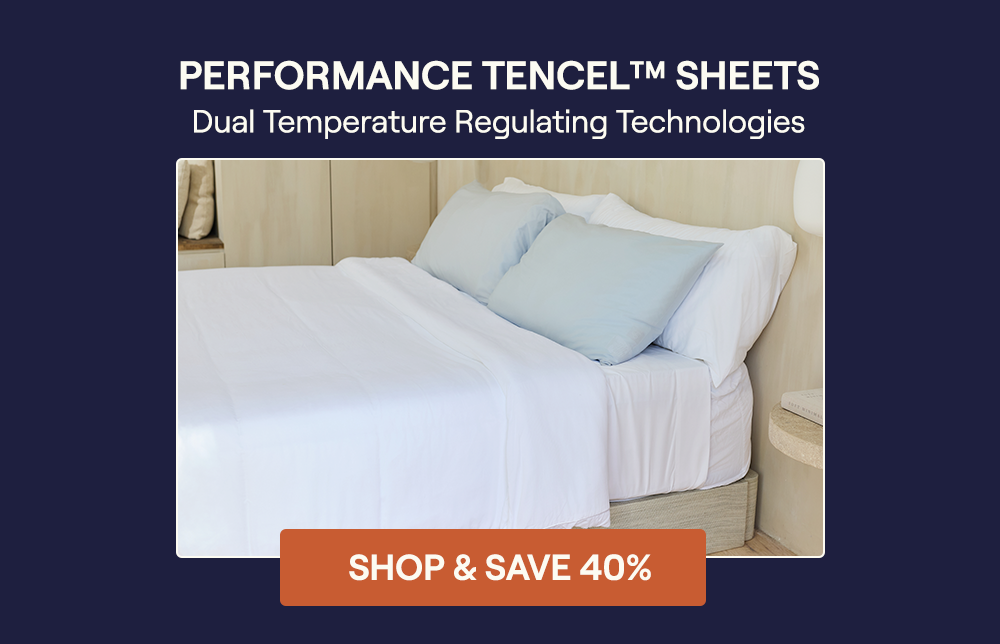 A White Performance TENCEL Sheet Set on a bed