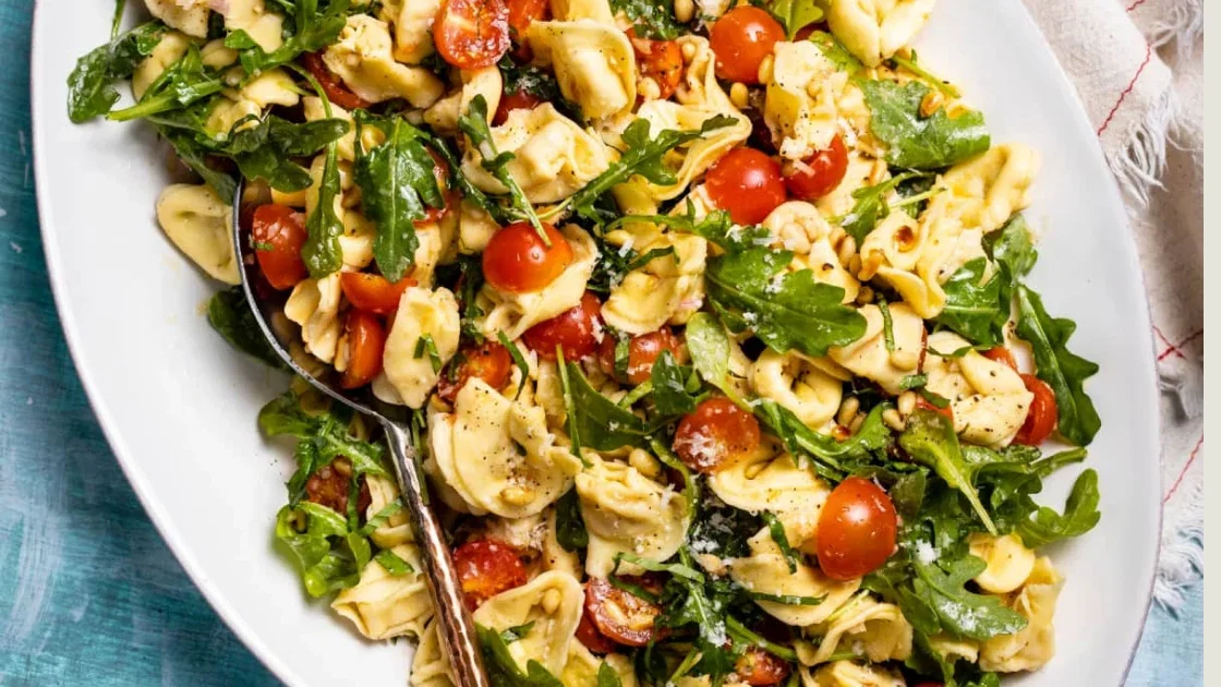 30-Minute Tortellini Salad with Cherry Tomatoes, Argulua, and Pine Nuts