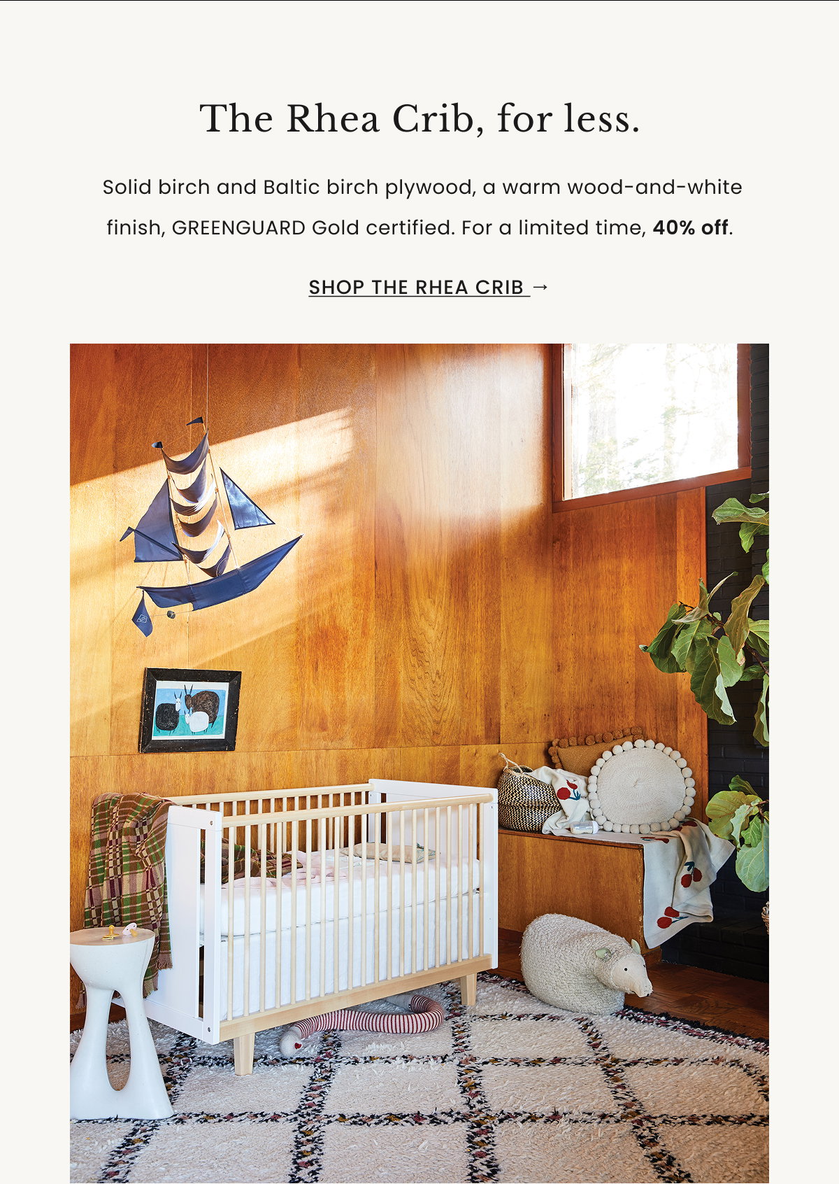 an image of a child's room with a crib and a rainbow