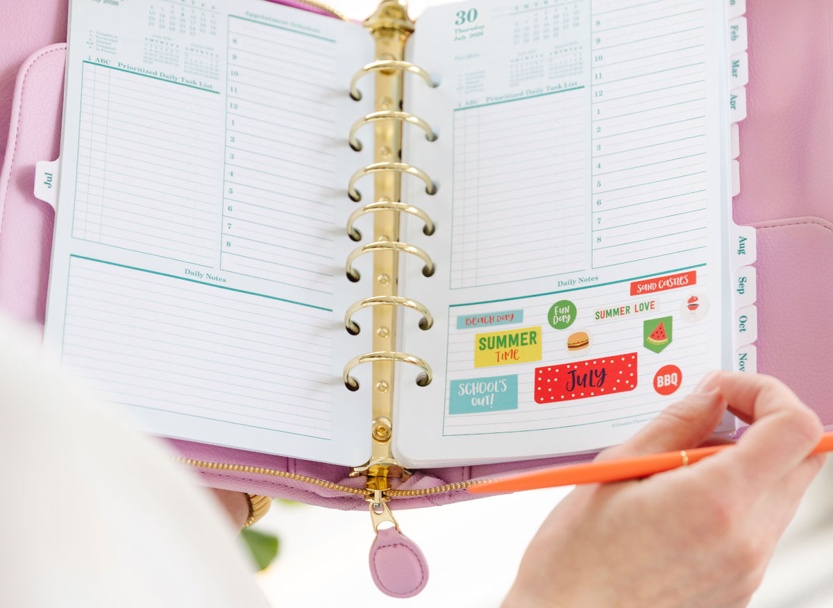 Picture of planner pages with stickers.