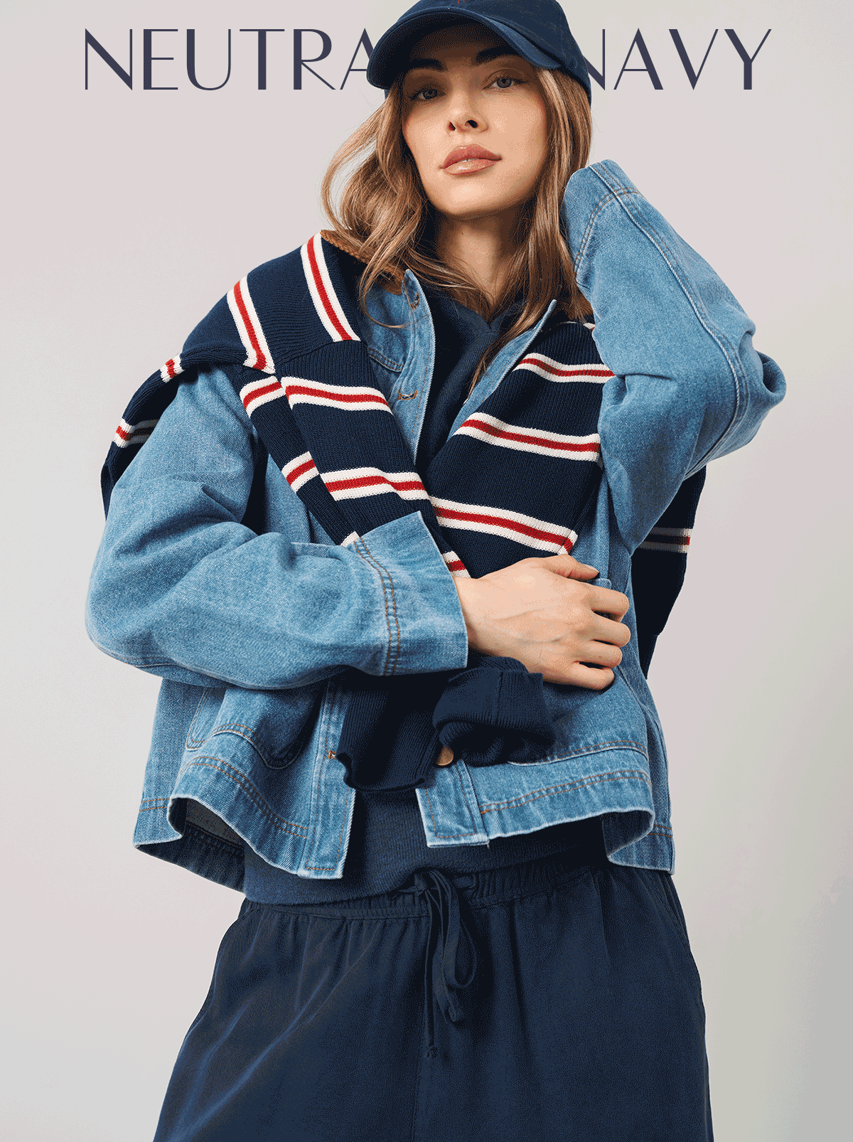 Animated hero featuring neutral navy styles styled with denim, stripes, and everyday layering.