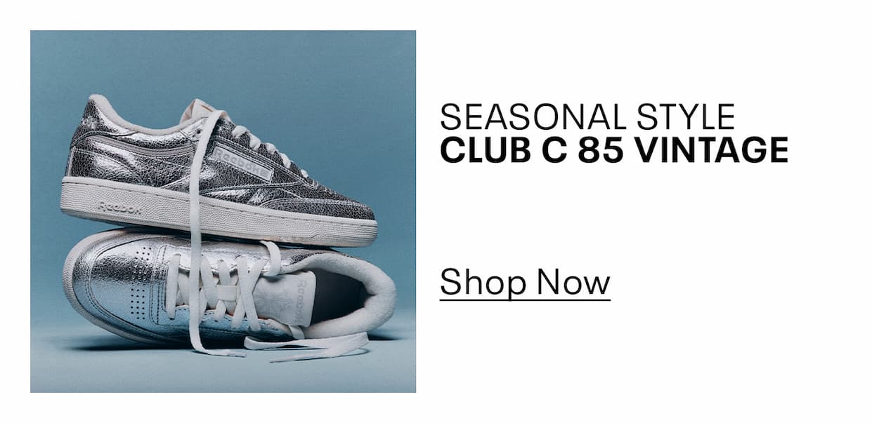 Silver Club C 85 Vintage sneakers are displayed against a blue background. Text reads: “SEASONAL STYLE. CLUB C 85 VINTAGE. Shop Now.”