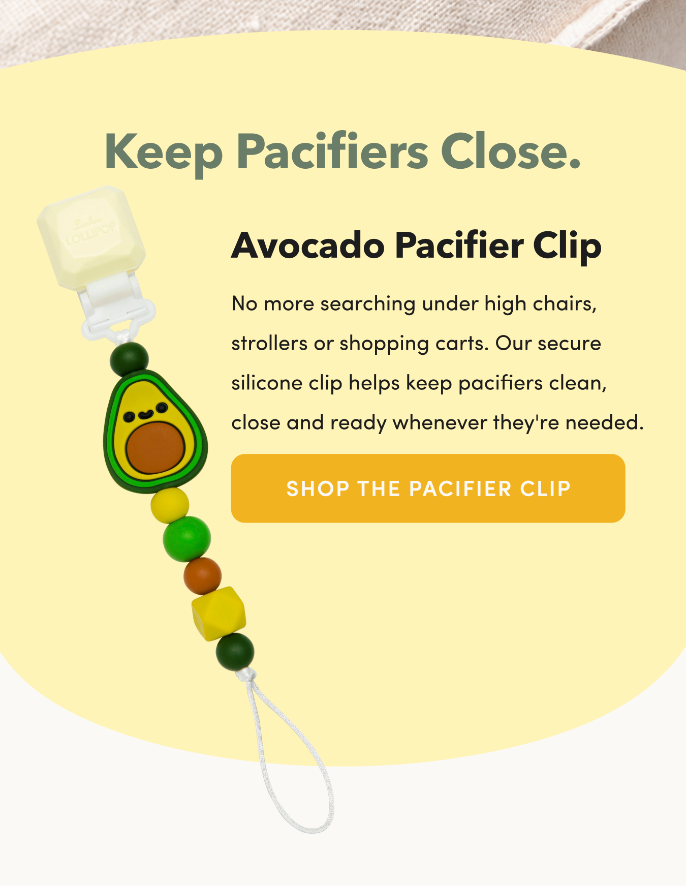 dark green headline text, black body text, and a photo of a silicone pacifier clip with avocado shape and coloured beads