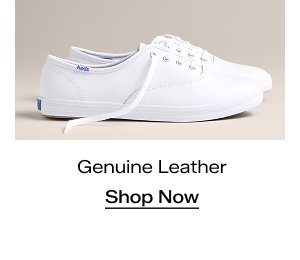 A side view of the Keds Champion Leather Lace-Ups in white which were $64.95 and are now $44.99 for a limited time. Text under the sneakers says Genuine Leather. Shop Now.