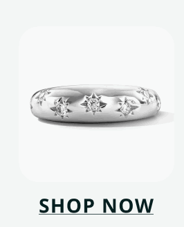 Sterling silver band ring with engraved star motifs & polished finish. Click here to shop now