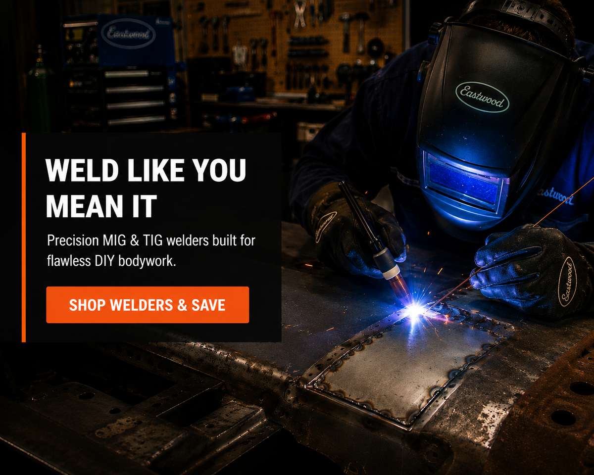 Welder TIG welding a metal body panel in a dark garage with sparks flying. Text reads “Weld Like You Mean It” and promotes MIG & TIG welders.