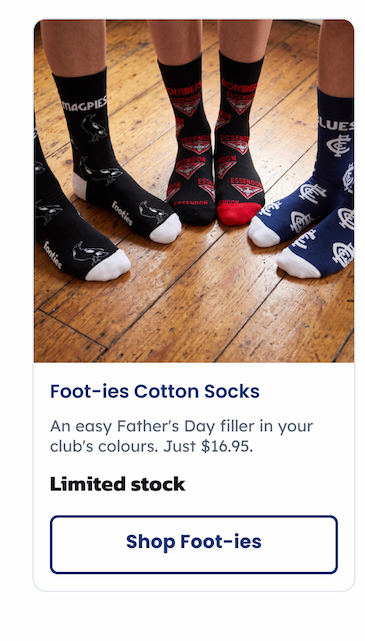 Three pairs of feet wearing AFL Foot-ies organic cotton socks