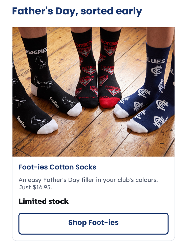 Three pairs of feet wearing AFL Foot-ies organic cotton socks
