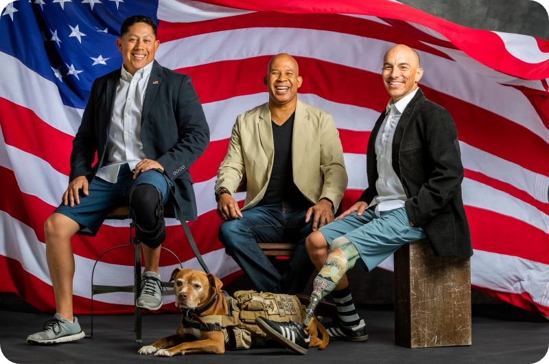 Four Service Members in Front of U.S. Flag