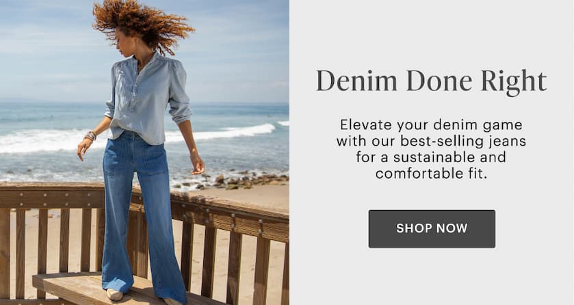 Denim Done Right - Shop now. Jeans in folded stack on wooden bench. 