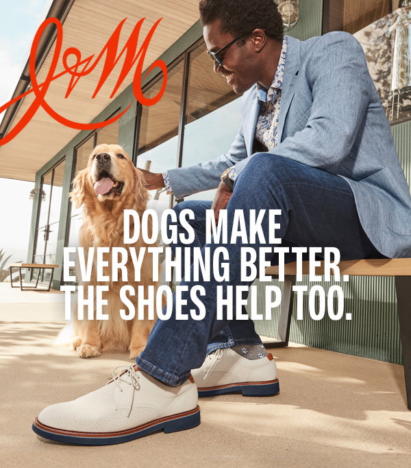 Model petting a golden retriever outside a modern home while wearing white Tyson Plain Toe shoes. Text reads: 