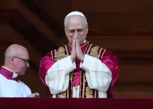 The newly elected Pontiff, Pope Leo XIV is seen for the first time from the Vatican balcony on May 8, 2025 in Vatican City, Vatican.