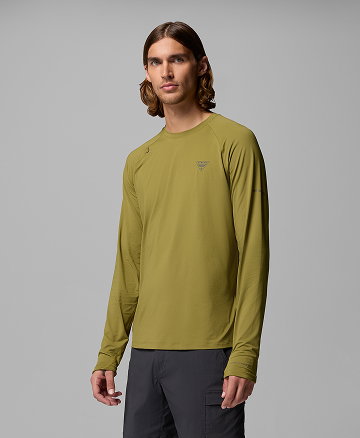 A man wearing a green long sleeve shirt.